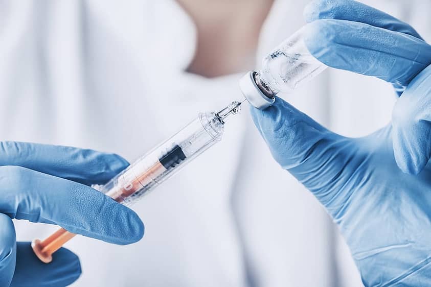 A researcher uses a vaccine for drug addiction