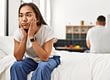 woman sitting on bed with morning despression