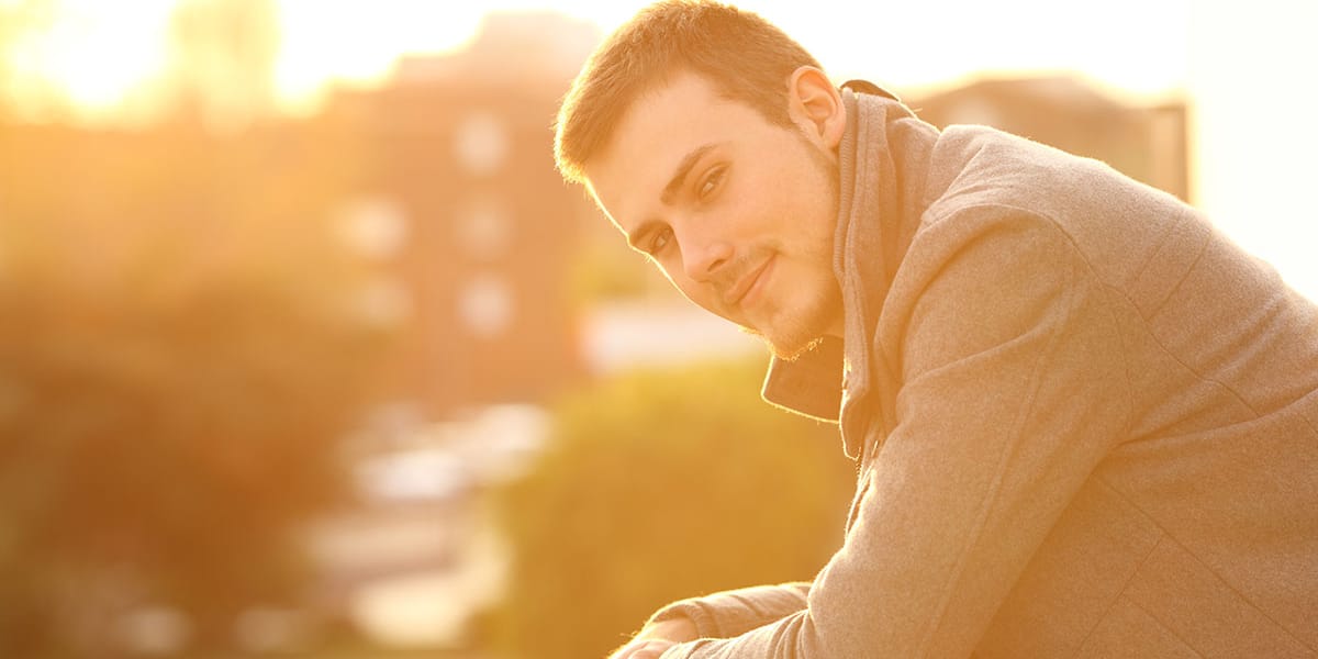 man smiling thinking about his safety in rehab