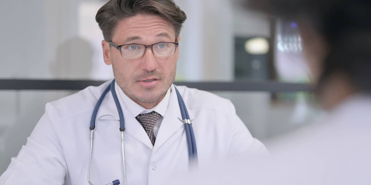 a doctor talking to a client about speedballs