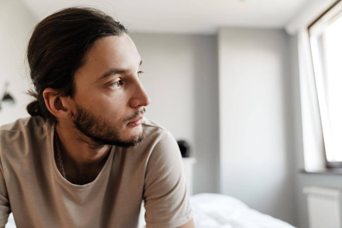 Man thinking about signs of speed drug addiction