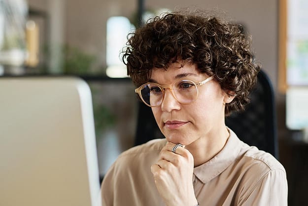 Woman thinking about the benefits of life skills training