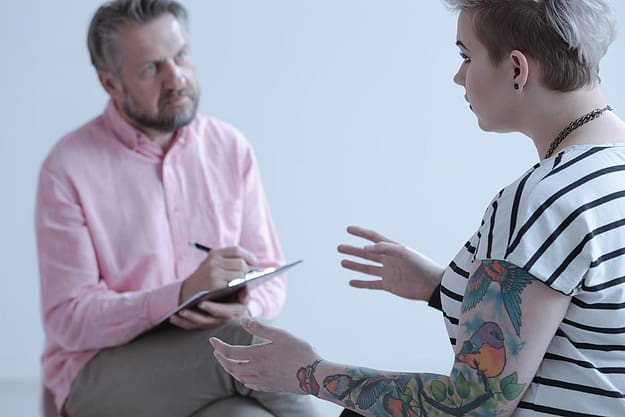 A therapist discusses cocaine abuse with a patient.