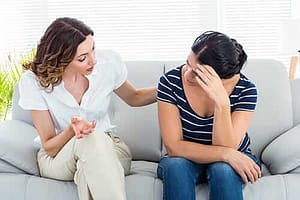 two women reviewing helpful coping skills