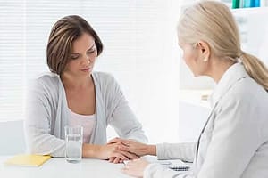 Two women at a women's mental health treatment center