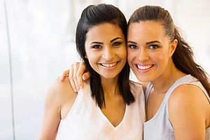 two young ladies enjoying the benefits of a women's treatment center