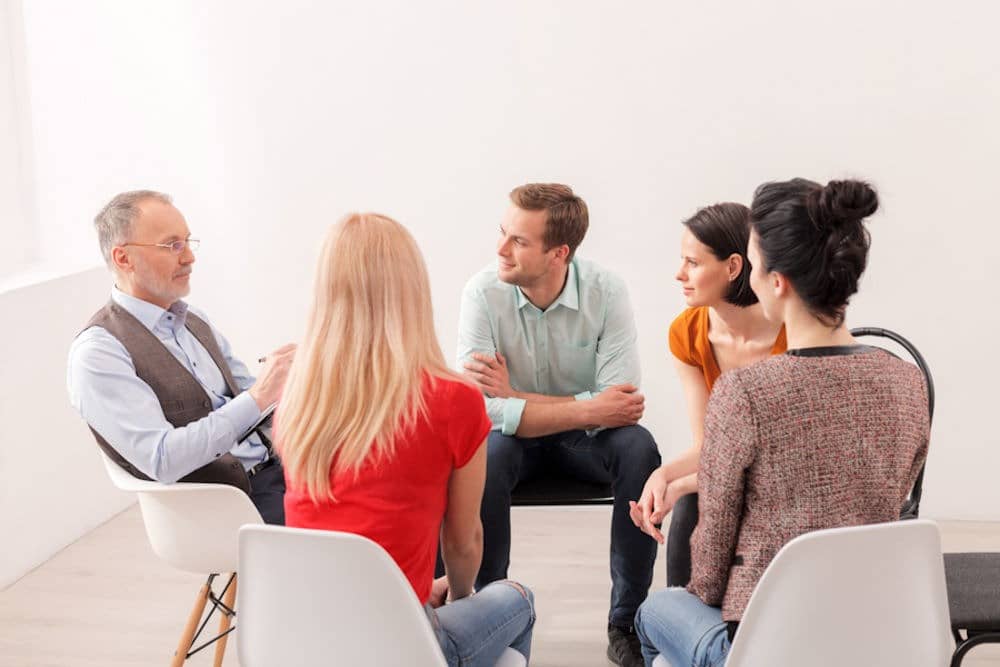 small group meeting with their therapist