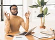 man taking a moment to relax while working from home
