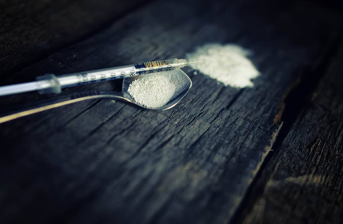 a spoon and needle related to the meth epidemic