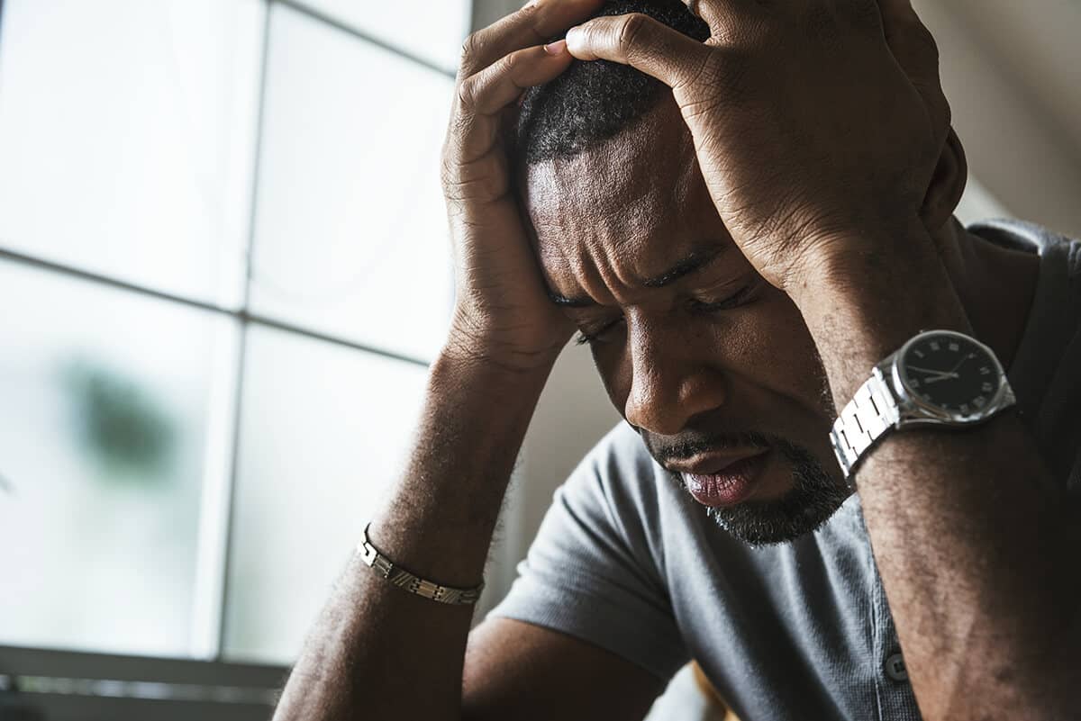 distraught man during stress awareness month