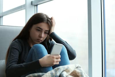 Depressed young adult woman needing rehab