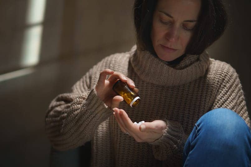 woman taking opioids in need of rehab