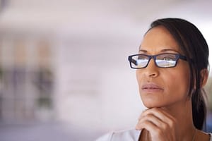 Michigan alcohol detox centers - woman with glasses staring off to the distance