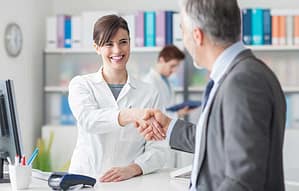 Clinician shaking hands with man after chatting about Florida detox facilities