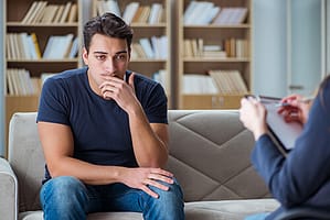 man talks to therapist about Vicodin Addiction Treatment