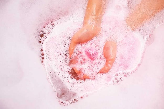 hands in soapy water bath salts effects