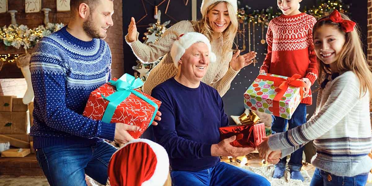 family opening presents together as a sober holiday activity