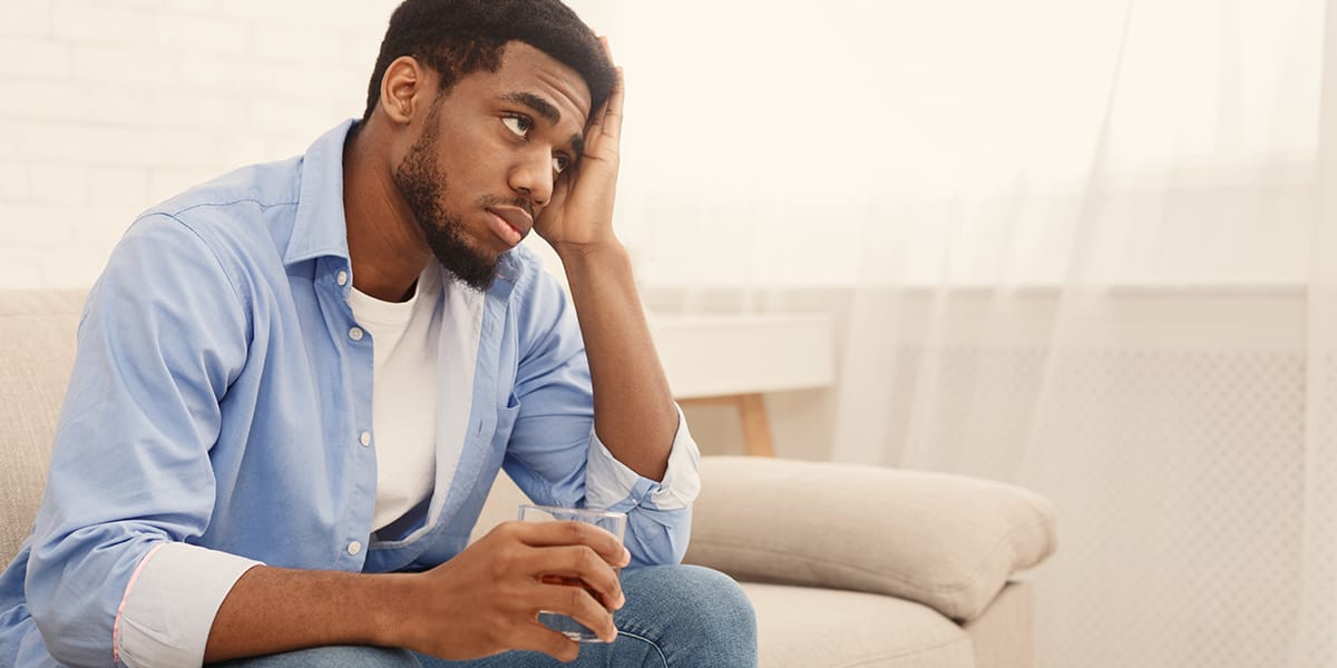 man struggling with alcohol detox at home