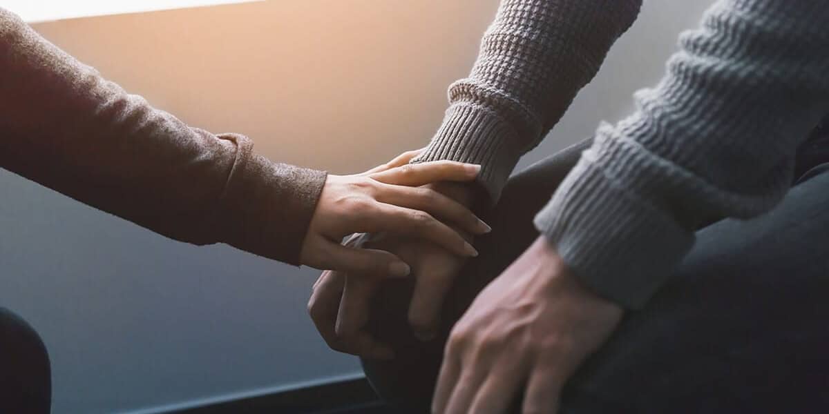 hands reaching out for drug addiction help for family members