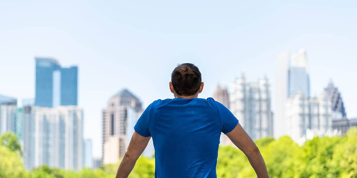 man looking out at the city from the men's drug addiction rehab atlanta ga