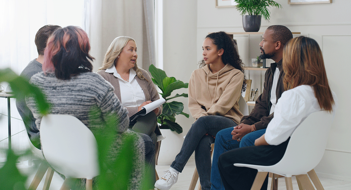 a therapy group participates in dialectical behavior therapy for addiction