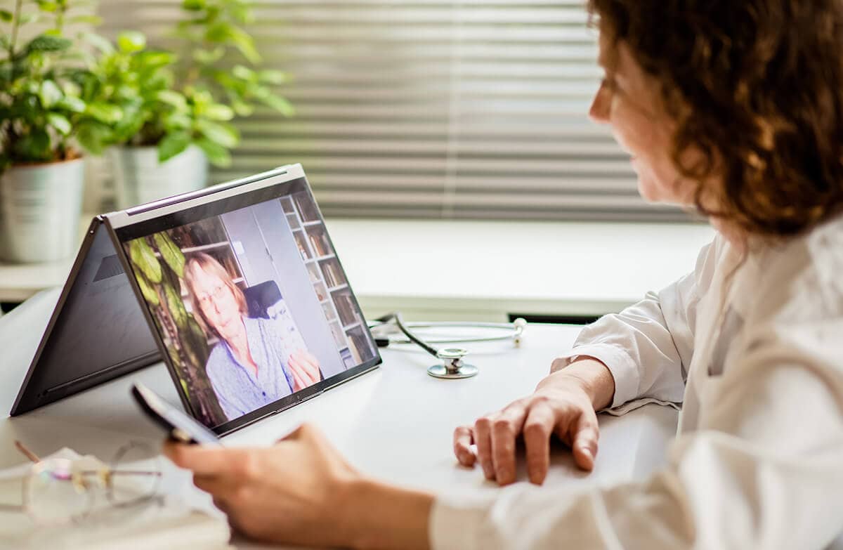 woman learning how a telehealth treatment program can benefit you
