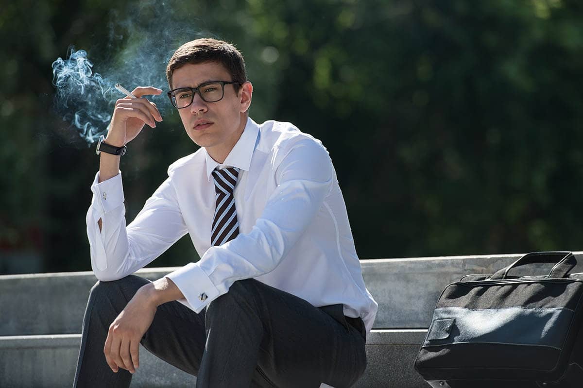 Man smoking a cigarette wonders what are gateway drugs
