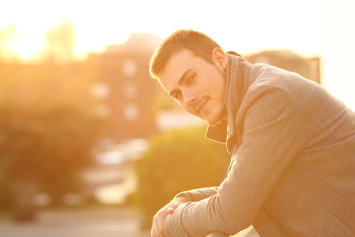 man smiling thinking about his safety in rehab