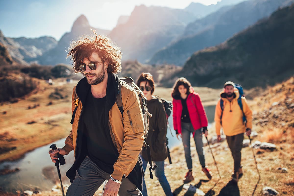 a group of people hiking during a wilderness therapy program