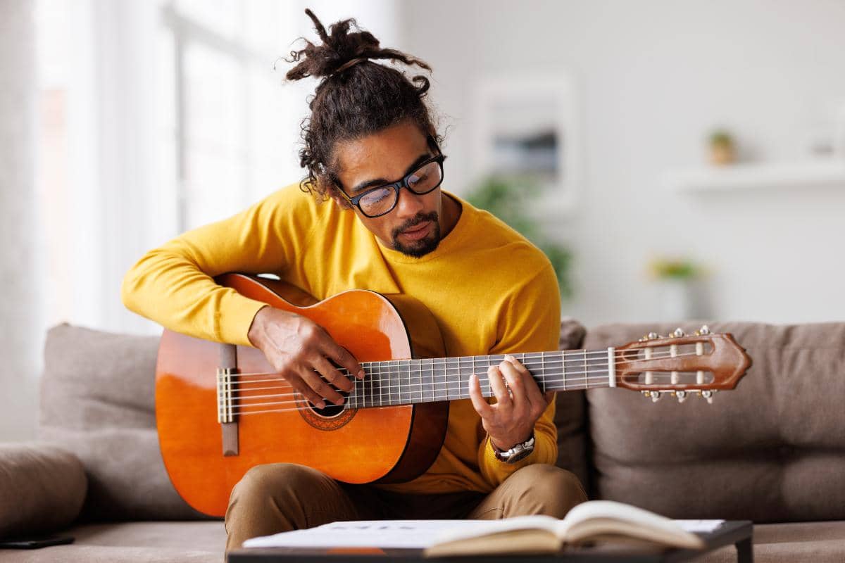 Man experiencing the benefits of music therapy for depression treatment