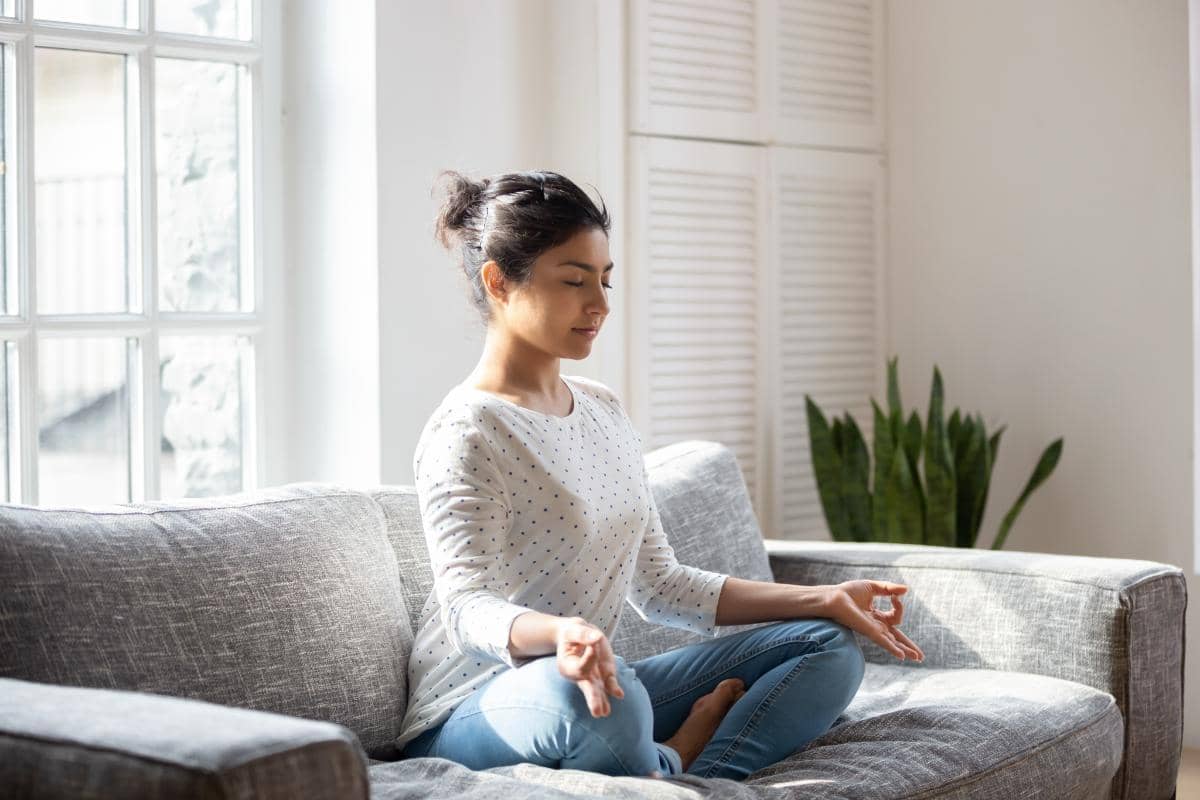Woman engaging in meditation for anxiety