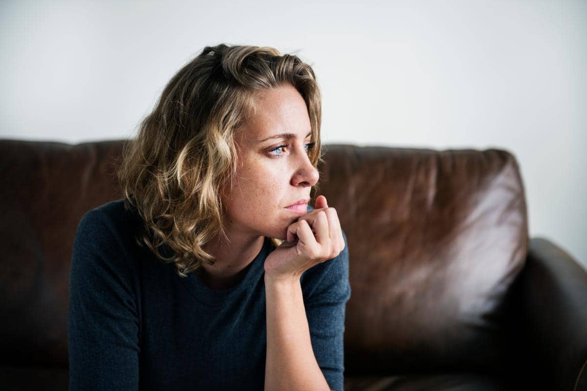 Woman deep in thought as she considers the myths about cocaine