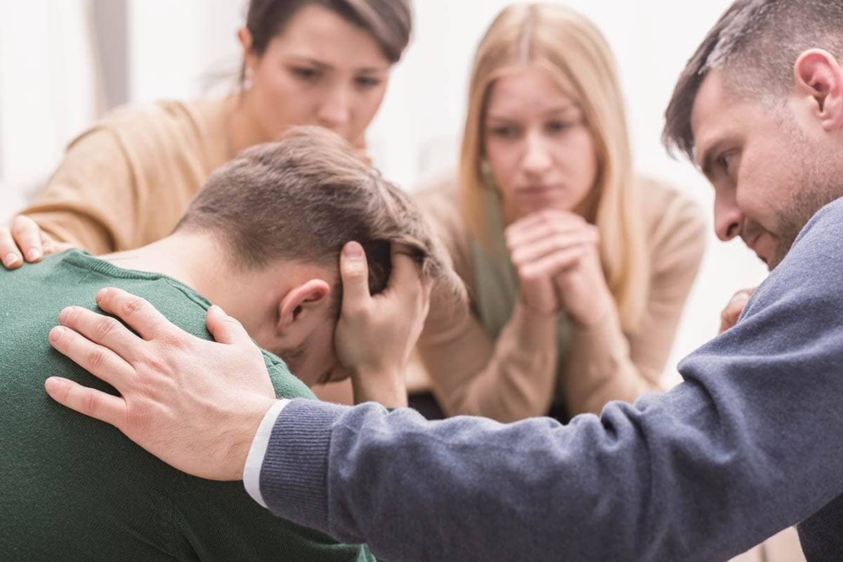 Group of people in the process of staging an intervention
