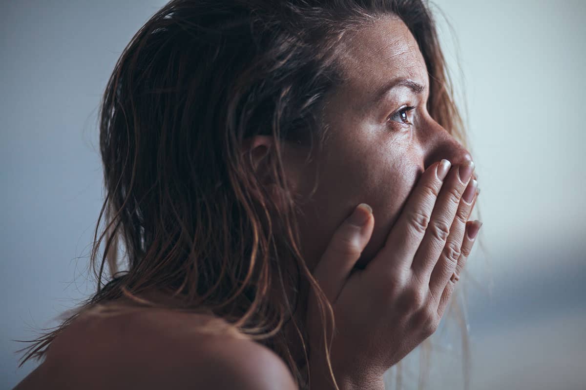 Woman struggling to deal with her dependent stressors and addiction