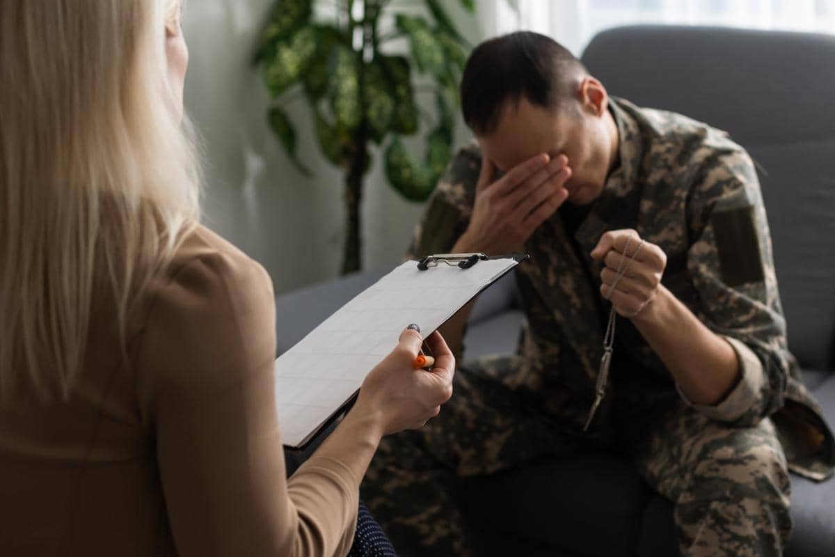 A combat veteran talks to a therapist.