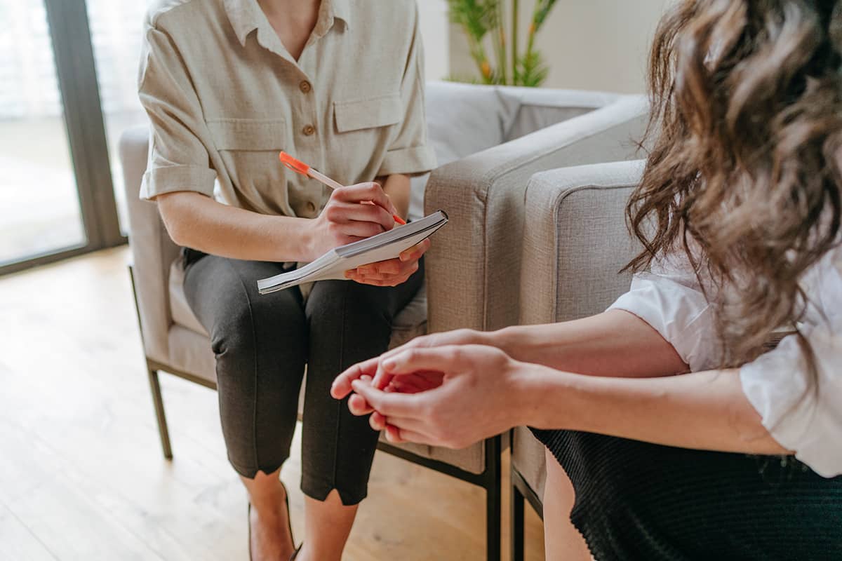 A woman learning about lorazepam addiction withdrawal symptoms
