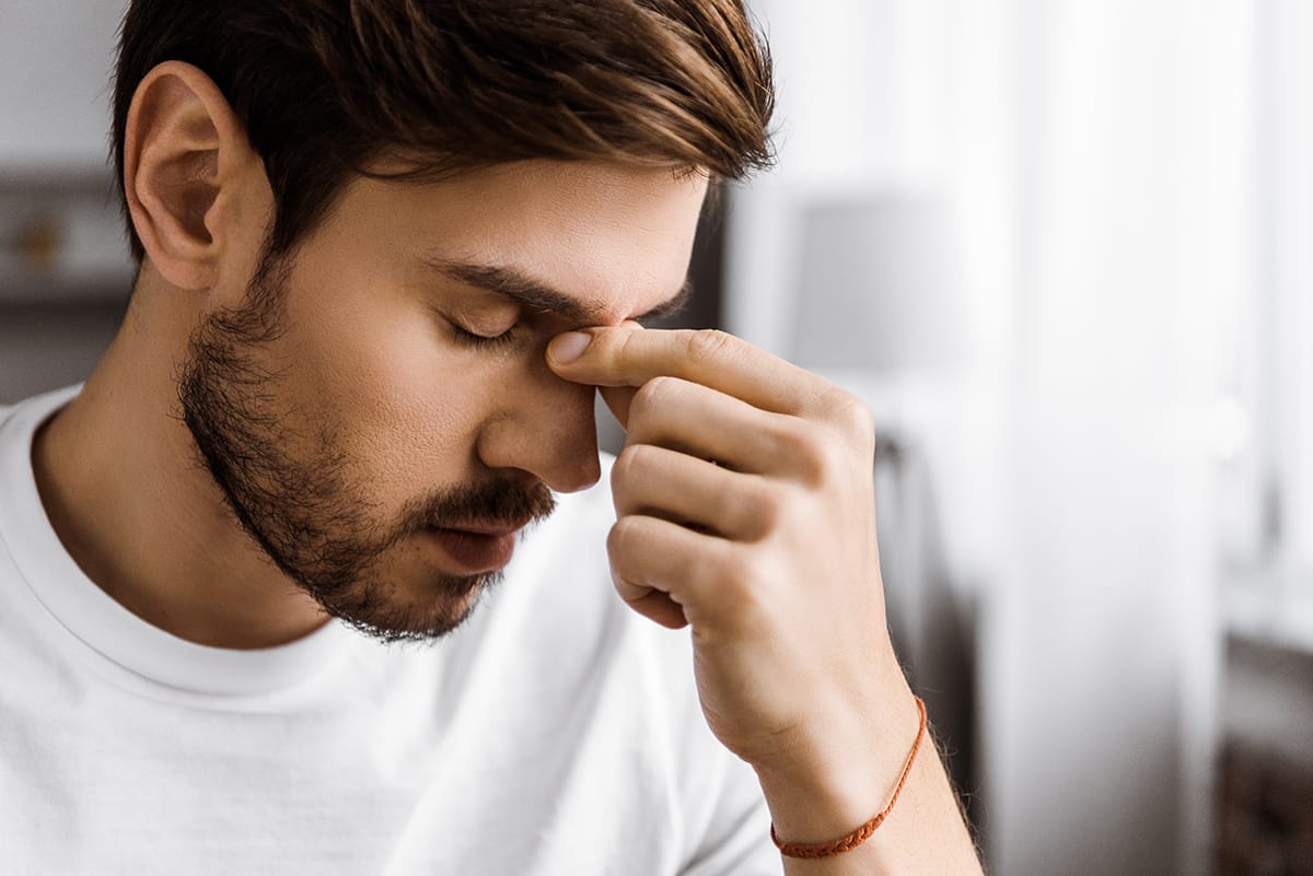 Man struggling due to imbalances caused by alcohol and dopamine