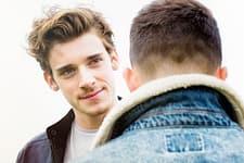 addiction rehab centers - 2 young men talking