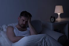 Restless Man Struggling With Benzodiazepine Addiction thinking about attending benzo addiction rehab
