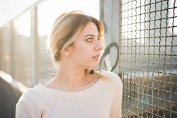 What cocaine addiction is like is a cage, like this woman is looking through.