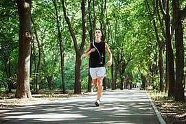 young man going on a run during exercise therapy