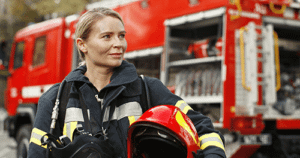 Firefighter takes off helmet, as she considers addiction treatment for first responders
