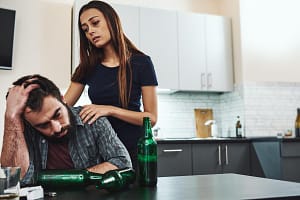 a couple is learning how to navigate dating an alcoholic