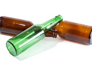 empty beer bottles representing the link between alcohol and anxiety