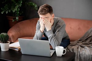 Man researching the phrase "dry drunk"