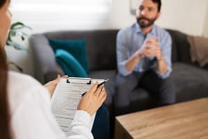 a person talks to a therapist in a meth detox center in North Carolina