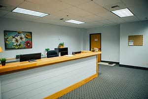 Long white reception desk at the Bayview Recovery Center