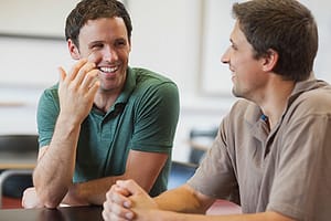 Two guys chatting at a mens rehab program in Oregon.