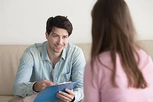 counselor telling client what happens during alcohol detox