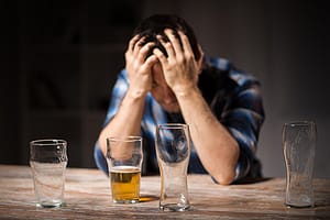 This man who is drinking on xanax shows signs of major depression
